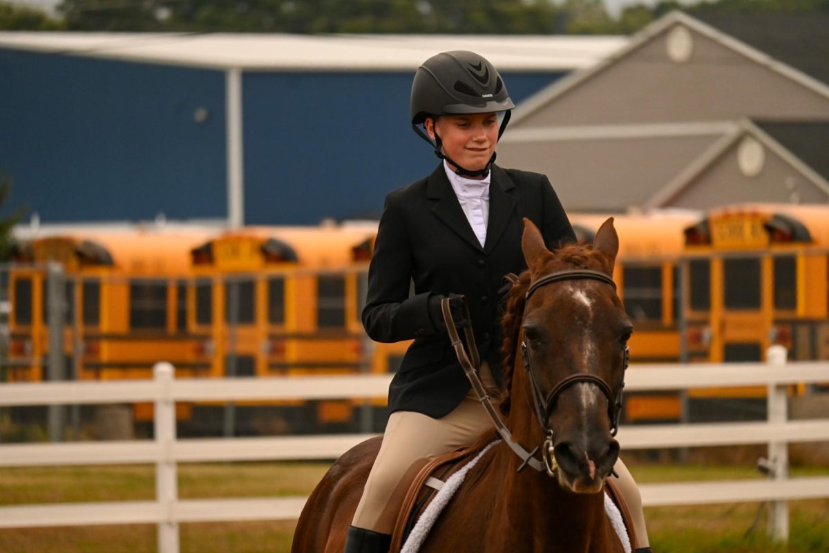 Madison Krugh is the first Brighton High School student to participate in the Equestrians with Disabilities program.