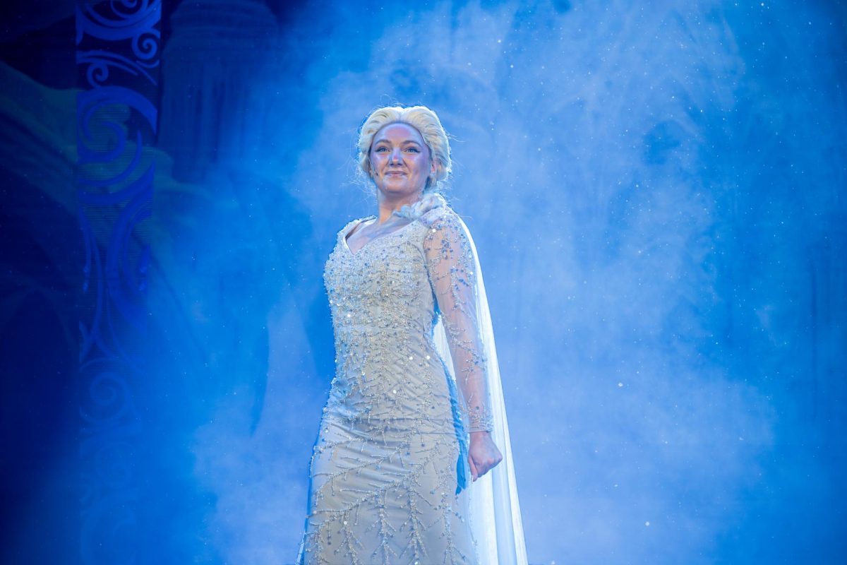 Playing the role of Elsa in Brighton High School's production of Disney's "Frozen," senior Zoe Vermiglio-Smetanka sings "Let It Go" at a rehearsal on March 5, 2026.