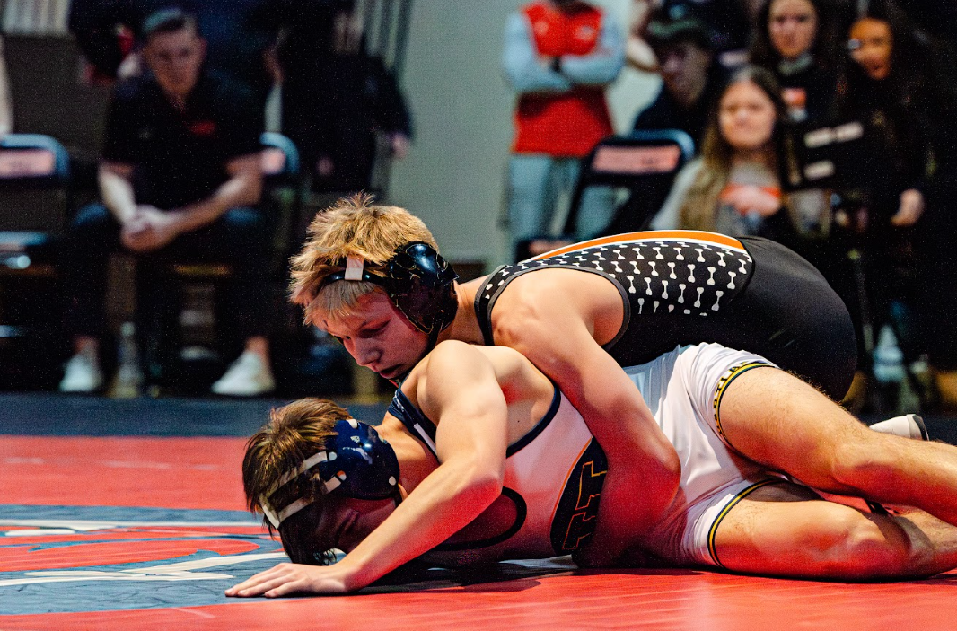 Senior Ethan Smith pins an opponent in a wrestling match. Smith, who ultimately placed third at the MHSAA Wrestling Individual State Finals from March 6-7, was one of ten Brighton students who made it to states; other qualifiers included sophomore Bronson Shinkonis, senior Drake Pollins, senior Xander Courneya, senior Kaden Tindall, senior Mason Gardner, sophomore Dominic Nauss, junior Sullivan Haas, senior Aleksander Salmon and senior Alexis Lazar.